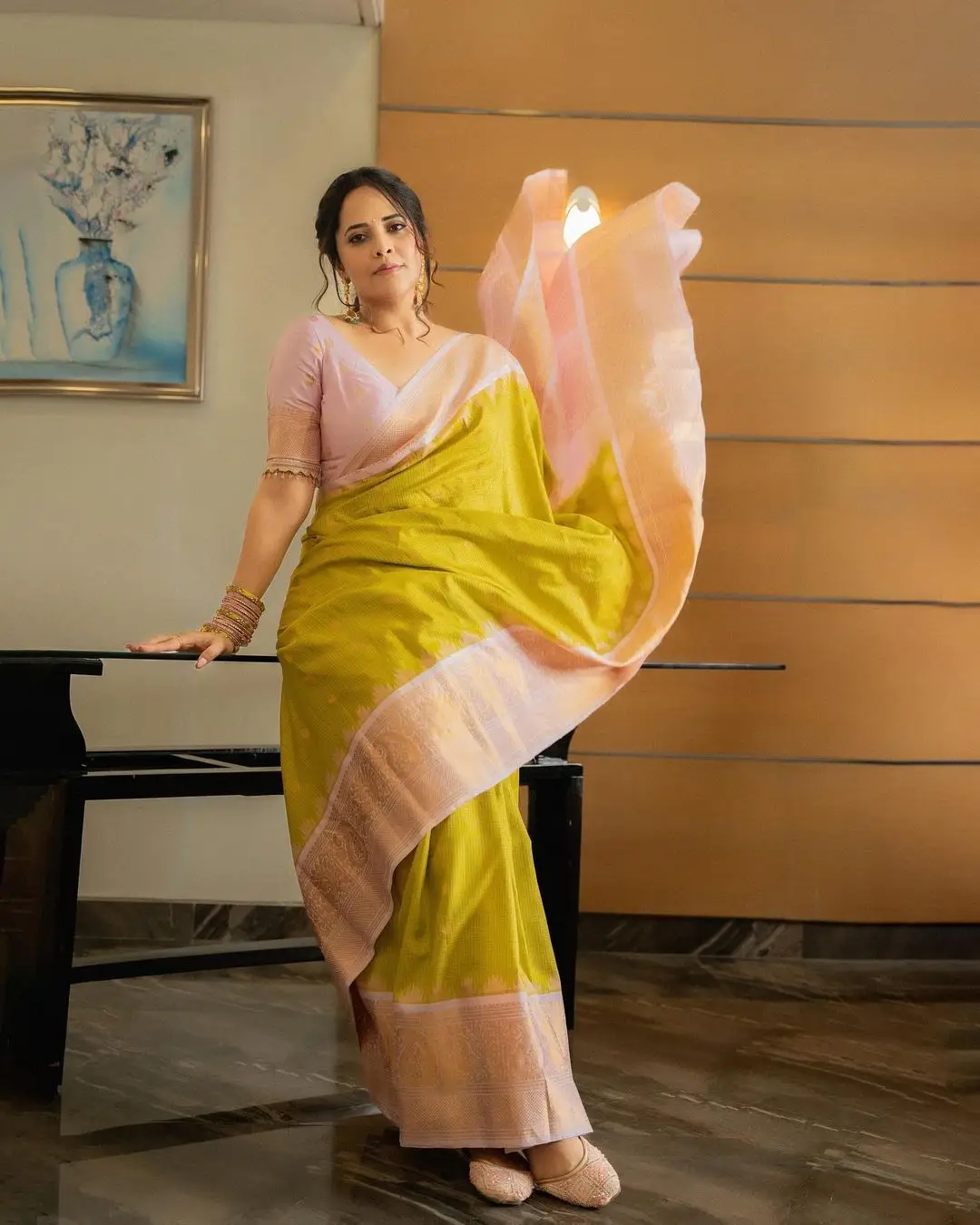 Anasuya Bharadwaj Wearing Beautiful Earrings Bangles Green Saree